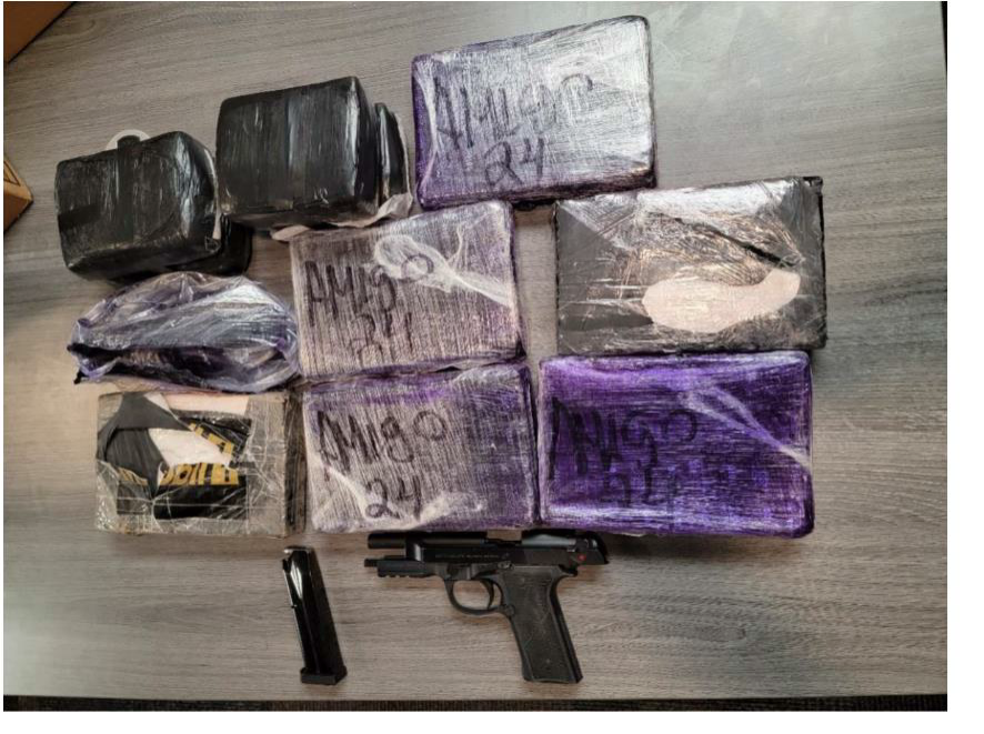 confiscated gun and bagged money