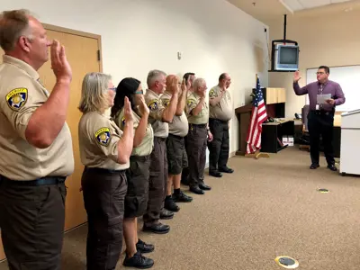 Posse graduating class taking oath