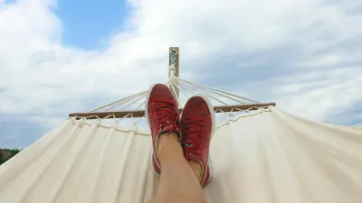 Person sitting in hammock